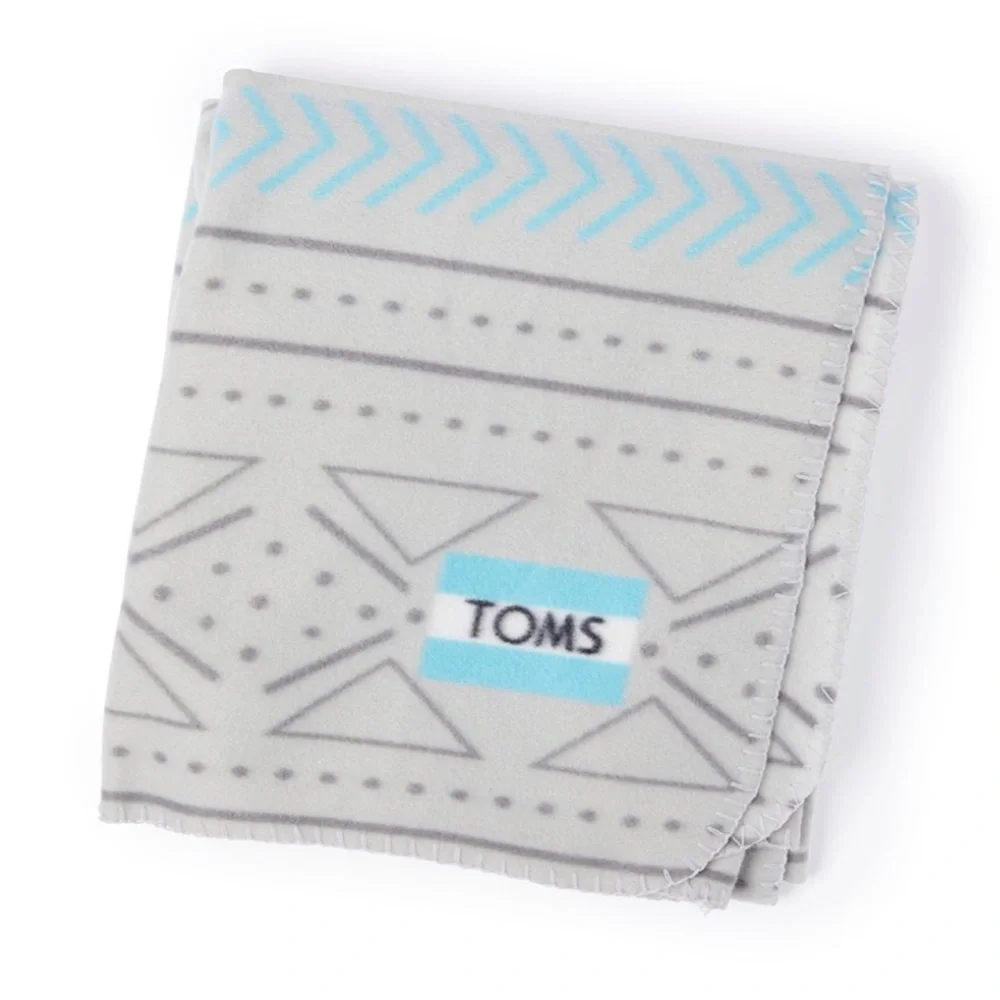 NWT Tom’s grey fleece blanket